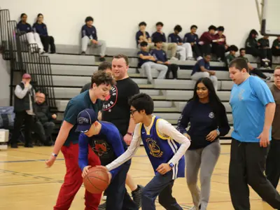Students playing basketball