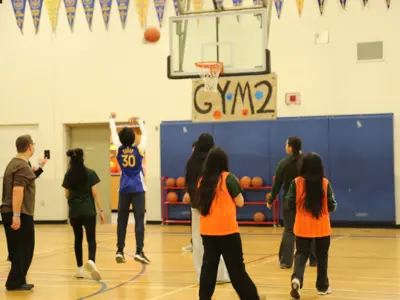 Students playing basketball
