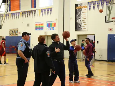 Students playing basketball